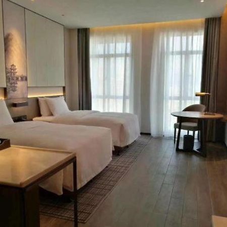 Wanda Jin Baise Hotel Extérieur photo