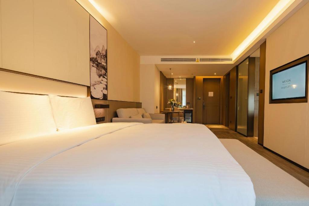 Wanda Jin Baise Hotel Extérieur photo