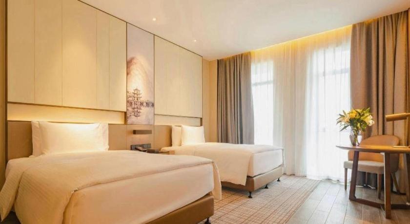 Wanda Jin Baise Hotel Extérieur photo